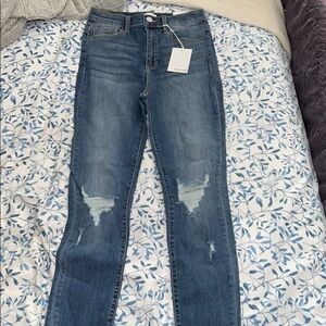 5/27 distressed knees skinny jeans